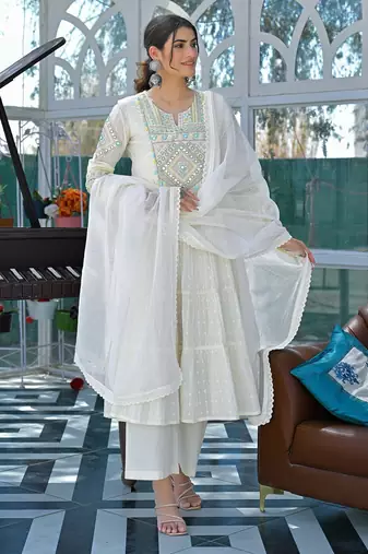 Blooming white cotton salwar suit with embroidered and lace work