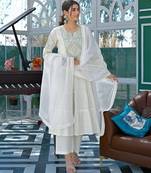 Blooming white cotton salwar suit with embroidered and lace work