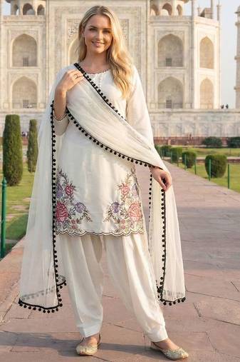 white crepe suit with sequin embroidery work