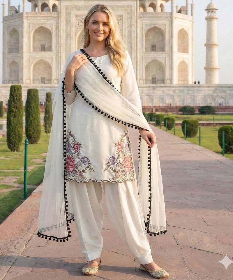 white crepe suit with sequin embroidery work