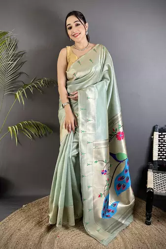 Pale blue tissue peacock & floral motifs mina zari weaving paithani saree
