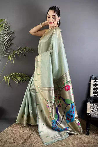 Pale blue tissue peacock & floral motifs mina zari weaving paithani saree