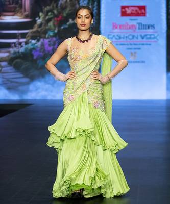 Green embroidered rawsilk saree 1