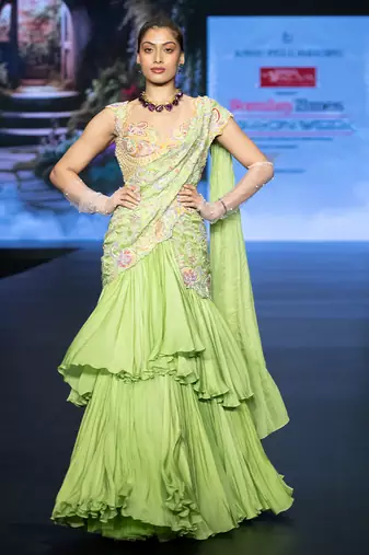 Green embroidered rawsilk saree