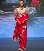 Red embroidered rawsilk saree