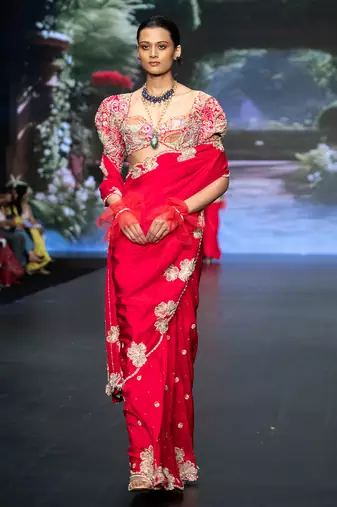 Red embroidered rawsilk saree