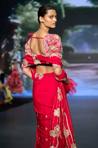 Red embroidered rawsilk saree