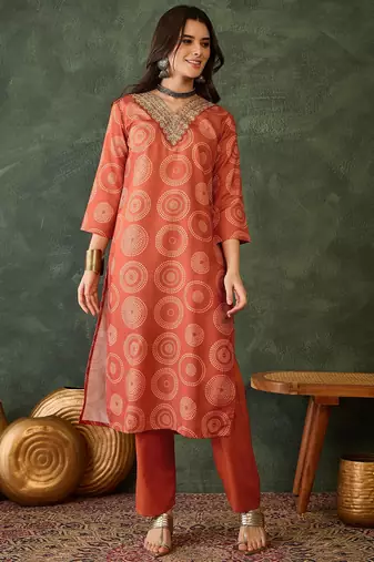 Women rust orange printed kurta set with dupatta