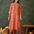 Women rust orange printed kurta set with dupatta