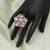 Pink color american diamond ring