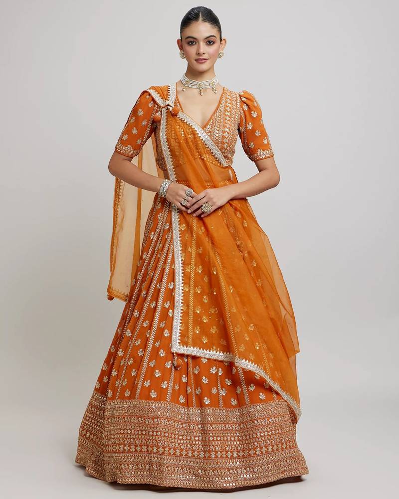 ORANGE RADIANCE 7MM AND 3MM MATTE SEQUINS WITH ZARI EMBROIDERED GEORGETTE LEHENGA CHOLI