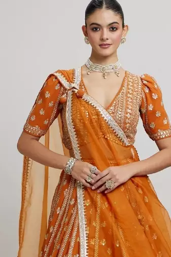 ORANGE RADIANCE 7MM AND 3MM MATTE SEQUINS WITH ZARI EMBROIDERED GEORGETTE LEHENGA CHOLI