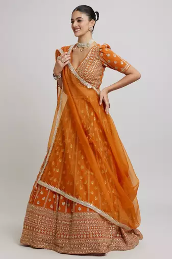 ORANGE RADIANCE 7MM AND 3MM MATTE SEQUINS WITH ZARI EMBROIDERED GEORGETTE LEHENGA CHOLI