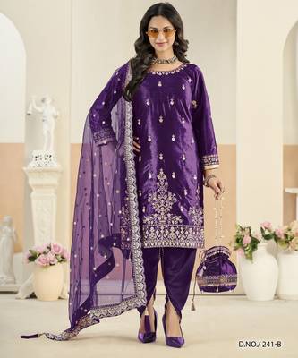 Embroided purple salwar suit made of ice velvet with net dupatta 1