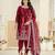 Embroided maroon salwar suit made of ice velvet with net dupatta