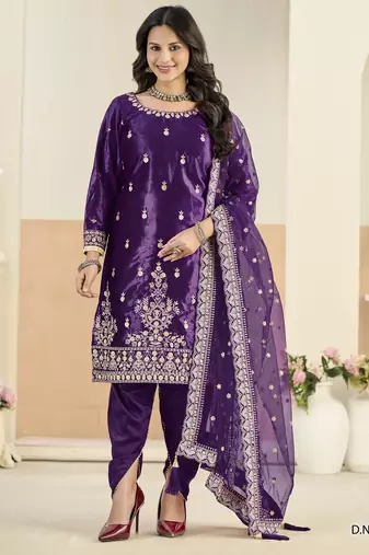 Embroided purple salwar suit made of ice velvet with net dupatta