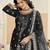 Embroided black salwar suit made of ice velvet with net dupatta
