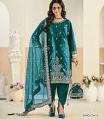 Embroided rama salwar suit made of ice velvet with net dupatta