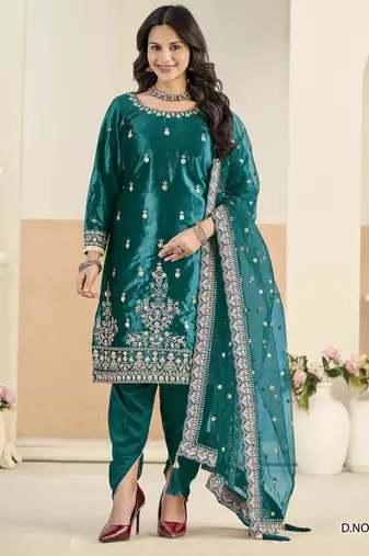 Embroided rama salwar suit made of ice velvet with net dupatta