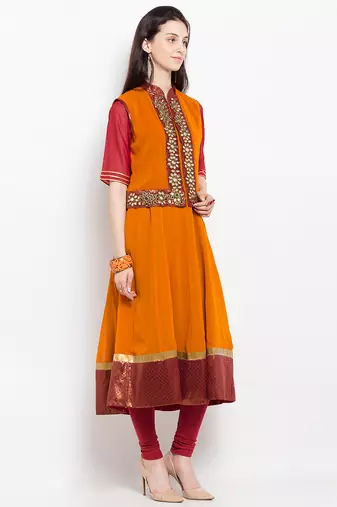 Orange embroidered georgette a line kurta churidar set
