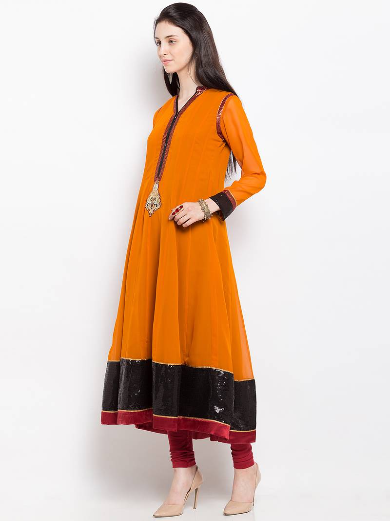 Mustard embroidered georgette a line kurta churidar set