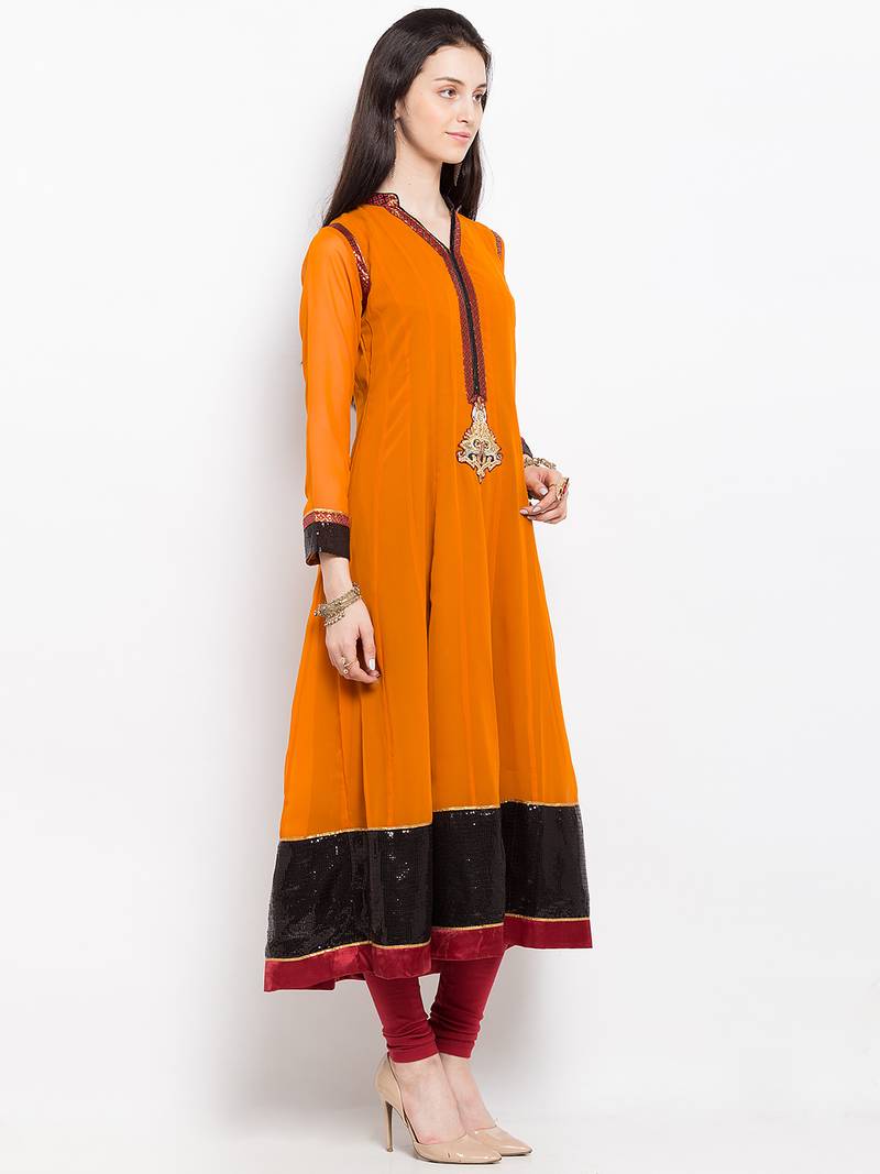 Mustard embroidered georgette a line kurta churidar set