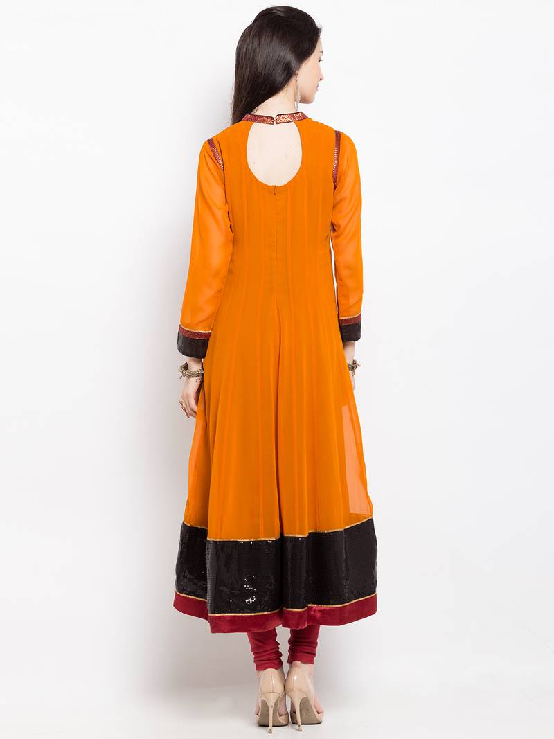 Mustard embroidered georgette a line kurta churidar set