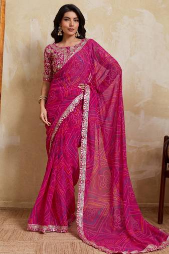 Mesmerizing pink georgette bandhej print with cutwork lace border saree with mono banglory silk blouse