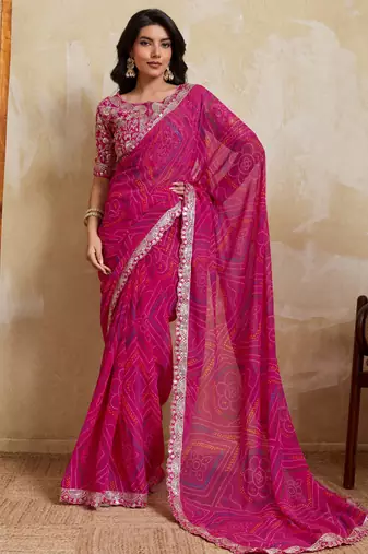 Mesmerizing pink georgette bandhej print with cutwork lace border saree with mono banglory silk blouse