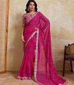 Mesmerizing pink georgette bandhej print with cutwork lace border saree with mono banglory silk blouse