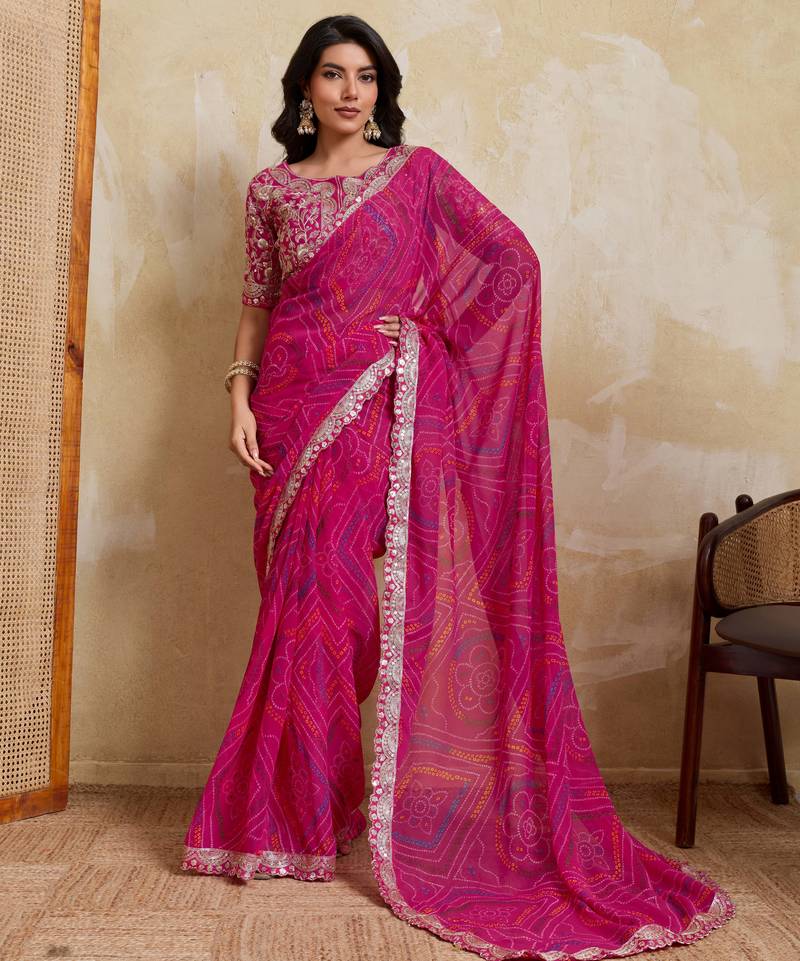 Mesmerizing pink georgette bandhej print with cutwork lace border saree with mono banglory silk blouse