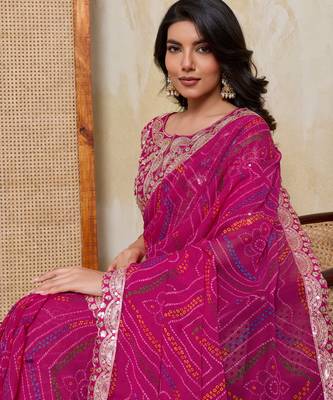 Mesmerizing pink georgette bandhej print with cutwork lace border saree with mono banglory silk blouse 2
