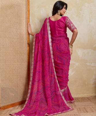 Mesmerizing pink georgette bandhej print with cutwork lace border saree with mono banglory silk blouse 3