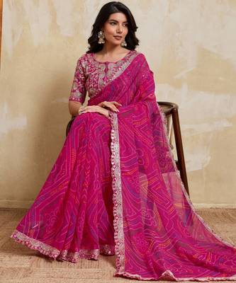 Mesmerizing pink georgette bandhej print with cutwork lace border saree with mono banglory silk blouse 5