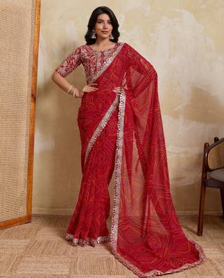 Catching red georgette bandhej print with cutwork lace border saree with mono banglory silk blouse 1