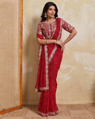 Catching red georgette bandhej print with cutwork lace border saree with mono banglory silk blouse 4