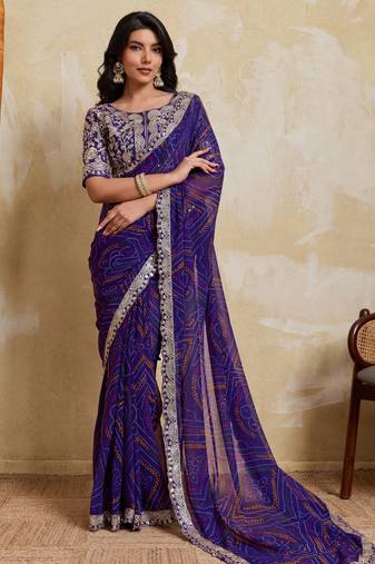 Delightful blue georgette bandhej print with cutwork lace border saree with mono banglory silk blouse