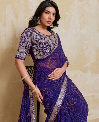 Delightful blue georgette bandhej print with cutwork lace border saree with mono banglory silk blouse 2