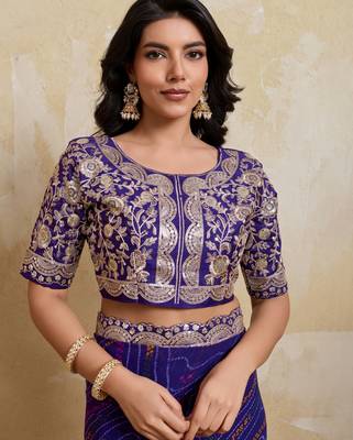 Delightful blue georgette bandhej print with cutwork lace border saree with mono banglory silk blouse 3