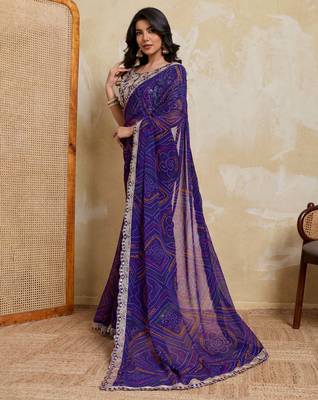 Delightful blue georgette bandhej print with cutwork lace border saree with mono banglory silk blouse 5