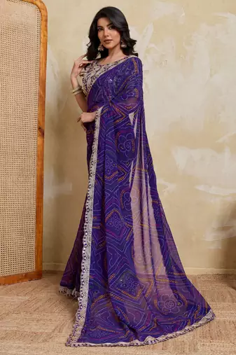 Delightful blue georgette bandhej print with cutwork lace border saree with mono banglory silk blouse