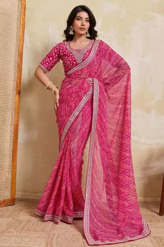 Bewitching pink georgette bandhej print with embroidery work lace border saree with mono banglory silk blouse
