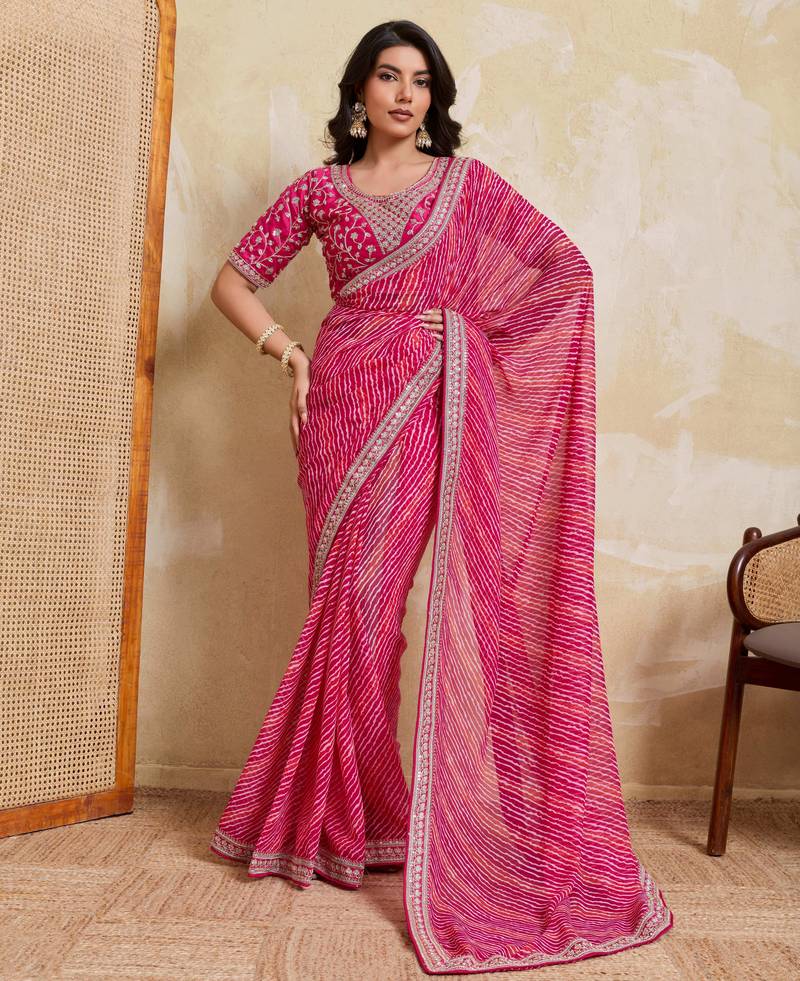 Bewitching pink georgette bandhej print with embroidery work lace border saree with mono banglory silk blouse
