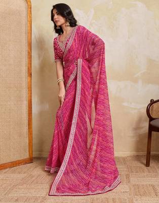 Bewitching pink georgette bandhej print with embroidery work lace border saree with mono banglory silk blouse 5