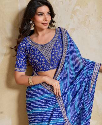 Fetching blue georgette bandhej print with embroidery work lace border saree with mono banglory silk blouse 2