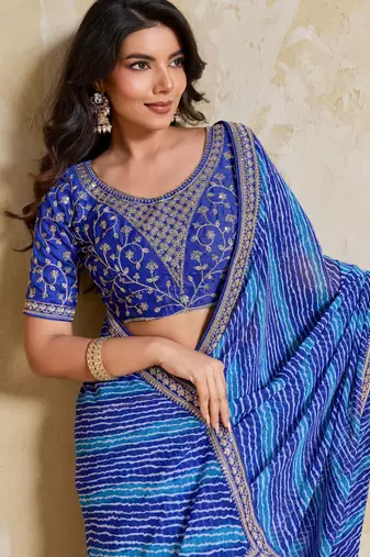 Fetching blue georgette bandhej print with embroidery work lace border saree with mono banglory silk blouse