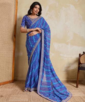 Fetching blue georgette bandhej print with embroidery work lace border saree with mono banglory silk blouse 3