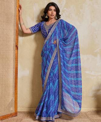 Fetching blue georgette bandhej print with embroidery work lace border saree with mono banglory silk blouse 5