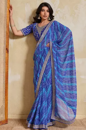 Fetching blue georgette bandhej print with embroidery work lace border saree with mono banglory silk blouse