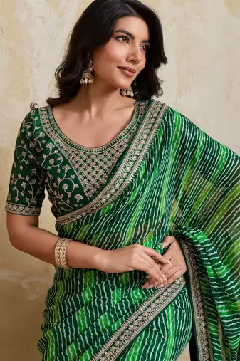 Glamorous green georgette bandhej print with embroidery work lace border saree with mono banglory silk blouse